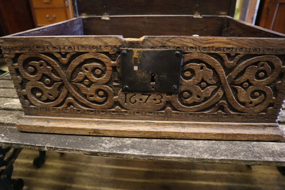 A 17th century carved oak bible box, width 63cm